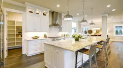 Modern white kitchen with ample storage space