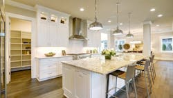 Modern white kitchen with ample storage space Modern white kitchen with ample storage space