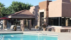 Pool and clubhouse at apartment complex Pool and clubhouse at apartment complex