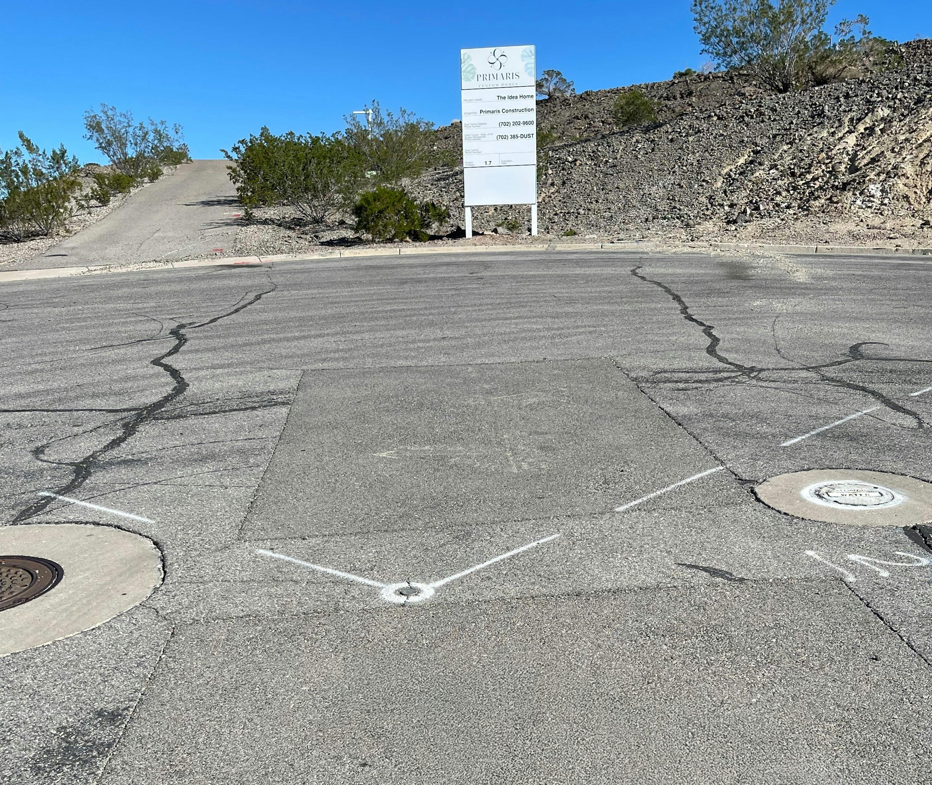 Property lines and utilities have been marked on the Carolla Build Idea Home site, and an existing access road will serve as the location of the main driveway once construction begins.