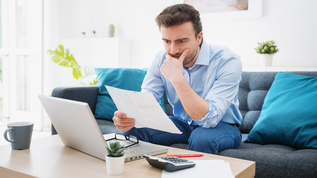 Young person working on their budget