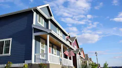 Row of small, newly-constructed single-family homes