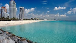 Beach in Miami with city skyline in the background Beach in Miami with city skyline in the background