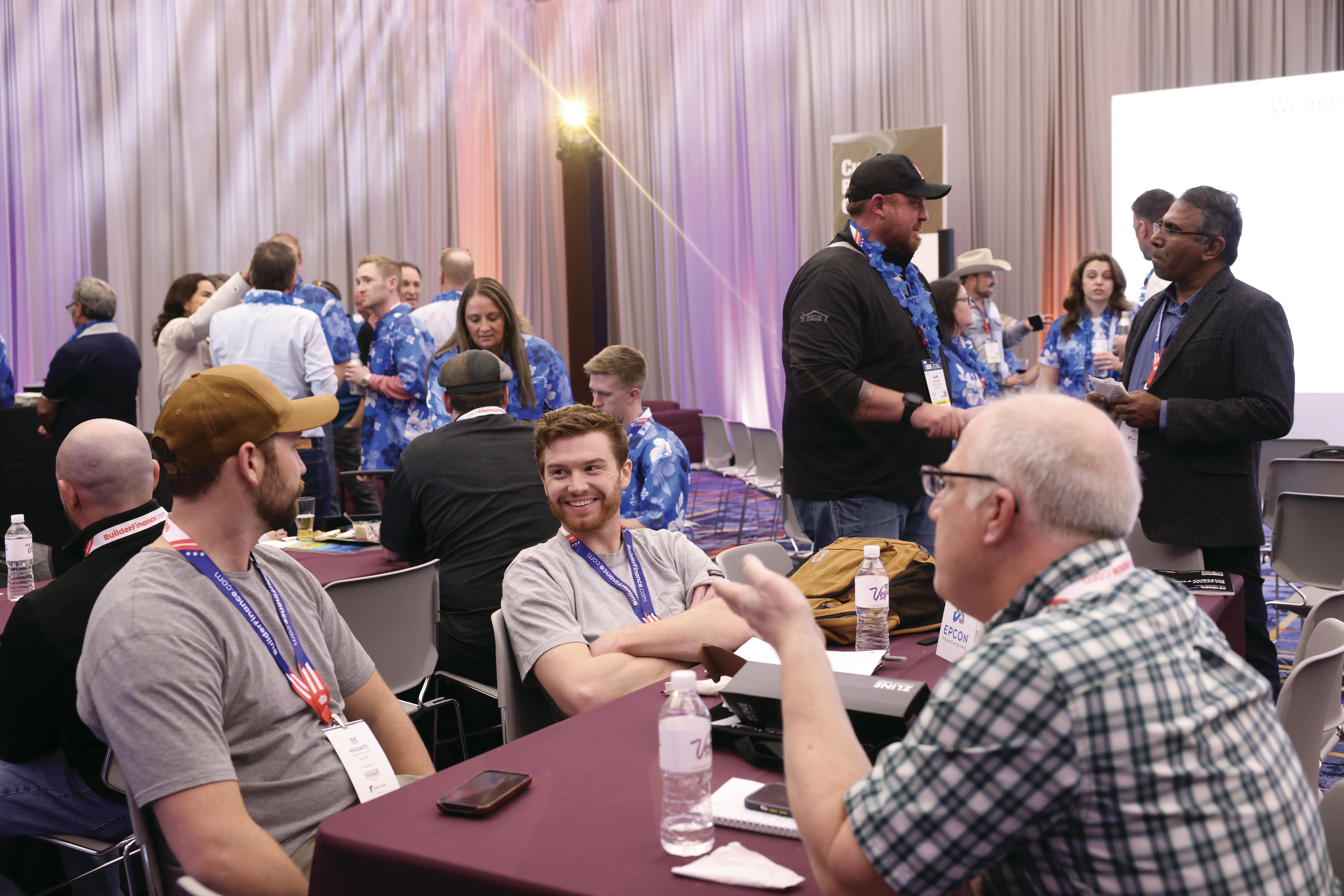 IBS attendees networking at the Custom Building Central