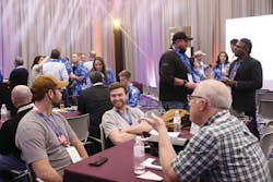 IBS attendees networking at the Custom Building Central IBS attendees networking at the Custom Building Central