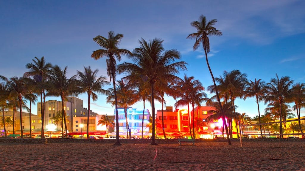 Sunset on the beach with Miami skyline in the background