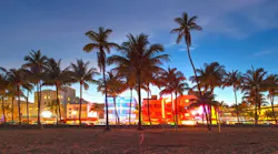 Sunset on the beach with Miami skyline in the background