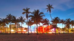 Sunset on the beach with Miami skyline in the background Sunset on the beach with Miami skyline in the background