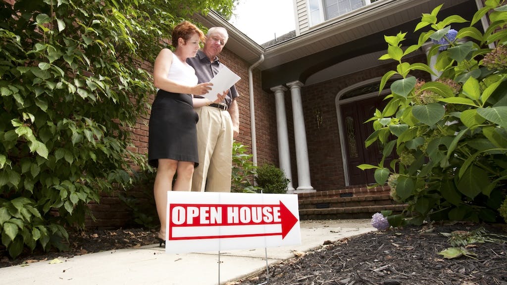 Prospective homebuyers touring an open house