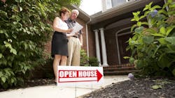Prospective homebuyers touring an open house Prospective homebuyers touring an open house