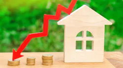 An arrow indicating falling home prices