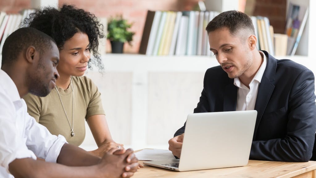 Designer meeting with two new clients