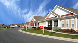Homes with 'For Sale' signs in the front yard