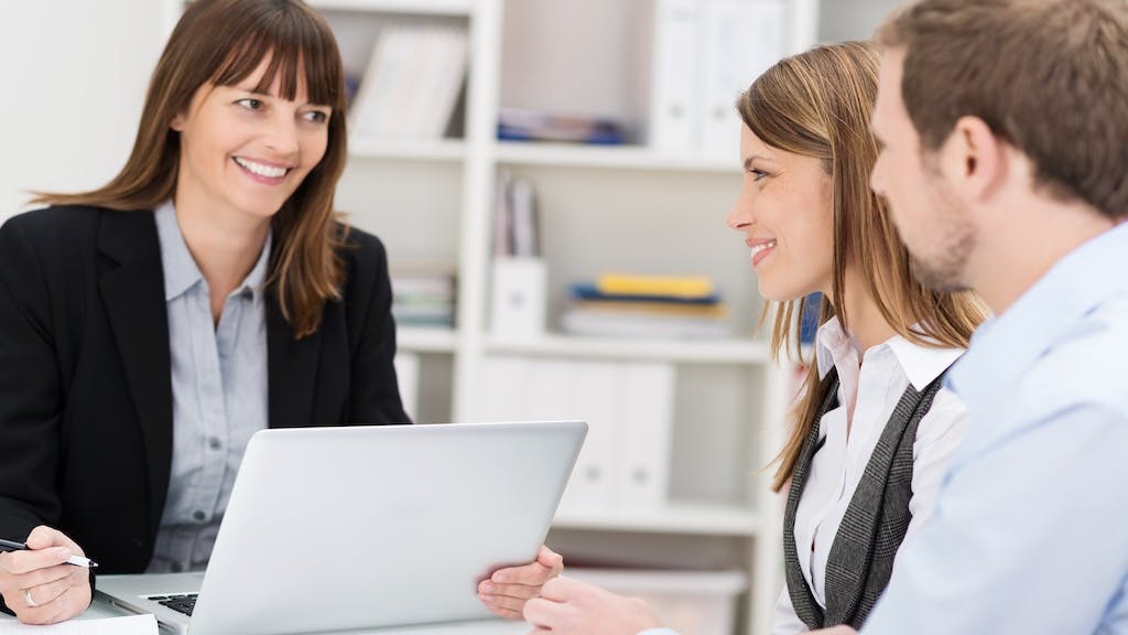 Sales person meeting with potential clients