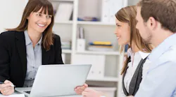 Sales person meeting with potential clients