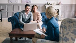 Young homebuyers meeting with a real estate agent Young homebuyers meeting with a real estate agent