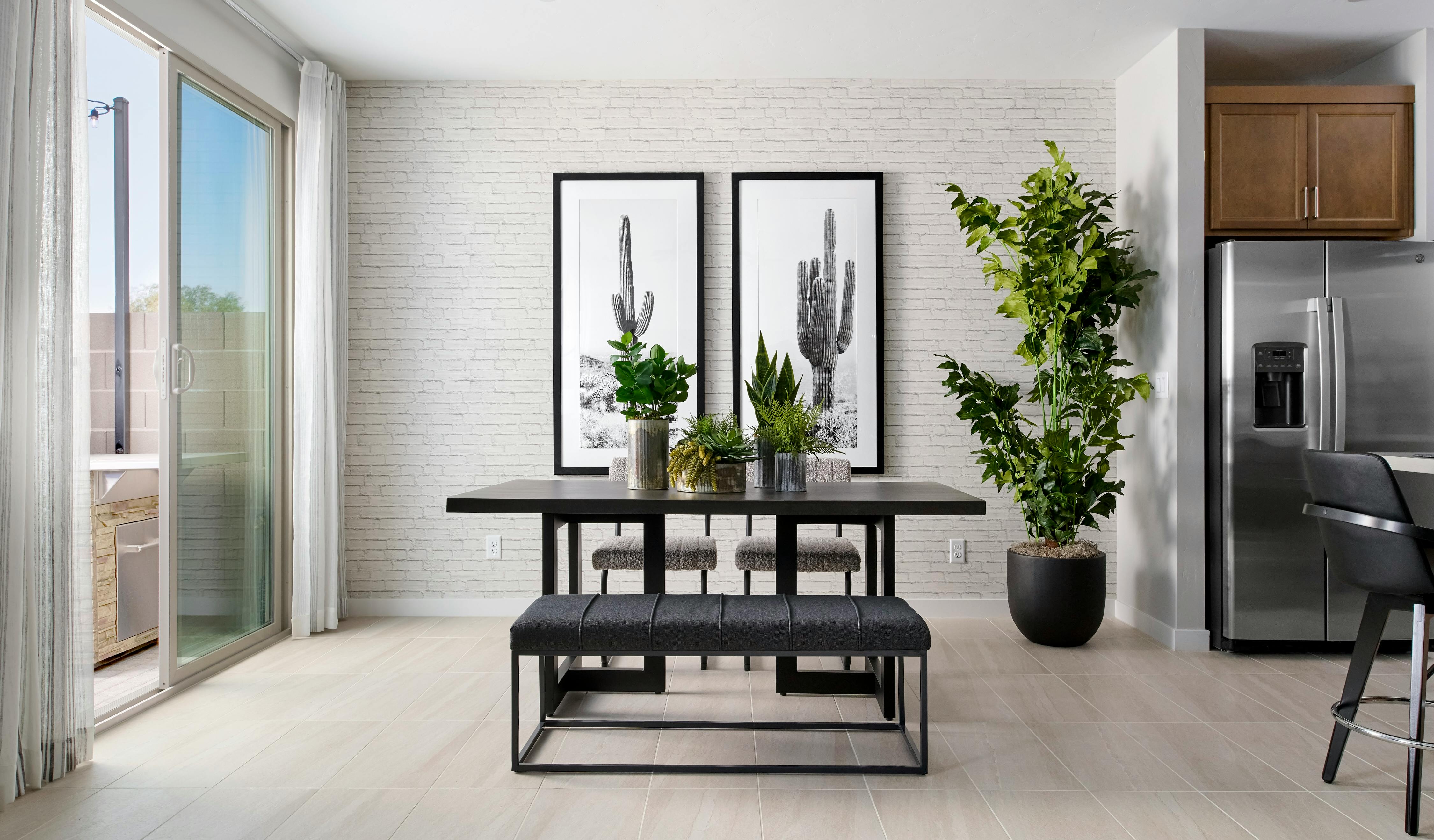 For the dining room at Southridge Pointe by Tri Pointe Homes and WHA in Las Vegas, Pacific Dimensions added subtle texture to one wall, a relatively low-cost yet memorable accent.