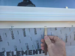 Do: Leave the lower window flange unsealed to drain incidental water. Also notice how the flange is set over the weather-resistant barrier (WRB). Do: Leave the lower window flange unsealed to drain incidental water. Also notice how the flange is set over the weather-resistant barrier (WRB).