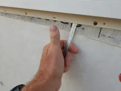 Don’t: The installers used a pan-head screw (good!), but sealed the bottom flange, which might trap water (bad). Don’t: The installers used a pan-head screw (good!), but sealed the bottom flange, which might trap water (bad).