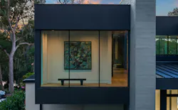 While most viewing areas orient to the lake, a private seating area within the primary suite footprint faces the front, offering a quiet space for the homeowner to enjoy privacy and select pieces of art. While most viewing areas orient to the lake, a private seating area within the primary suite footprint faces the front, offering a quiet space for the homeowner to enjoy privacy and select pieces of art.