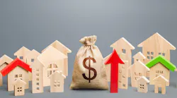 Arrow next to model homes indicating rising home prices