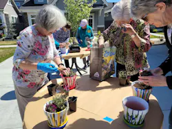 At Cadence Century Farm, a 55+ community in Meridian, Idaho, residents rolled up their sleeves for a 'Plant Your Own Flower Pot' event hosted by the Cadence Gardening Club. 'It was a beautiful day to get their hands dirty and growing something special together,' says community lifestyle director Amanda Travers. At Cadence Century Farm, a 55+ community in Meridian, Idaho, residents rolled up their sleeves for a 'Plant Your Own Flower Pot' event hosted by the Cadence Gardening Club. 'It was a beautiful day to get their hands dirty and growing something special together,' says community lifestyle director Amanda Travers.