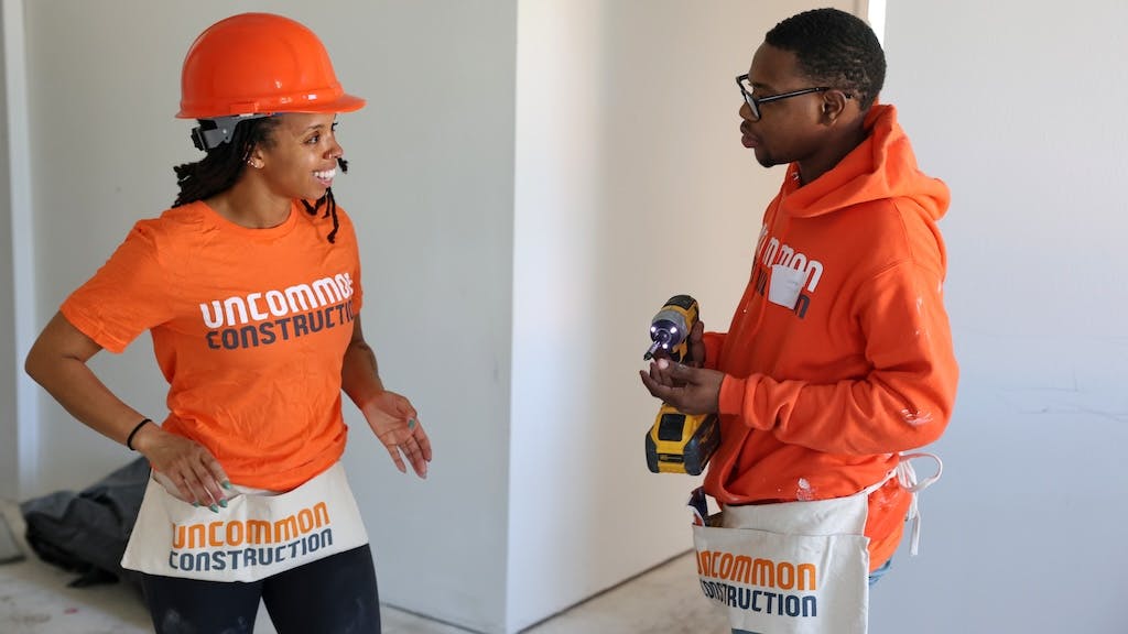 During the Community Build day, volunteers worked with uCC apprentices to complete two residential construction projects.