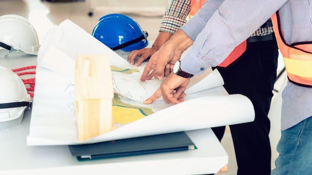 Home builders working on project together