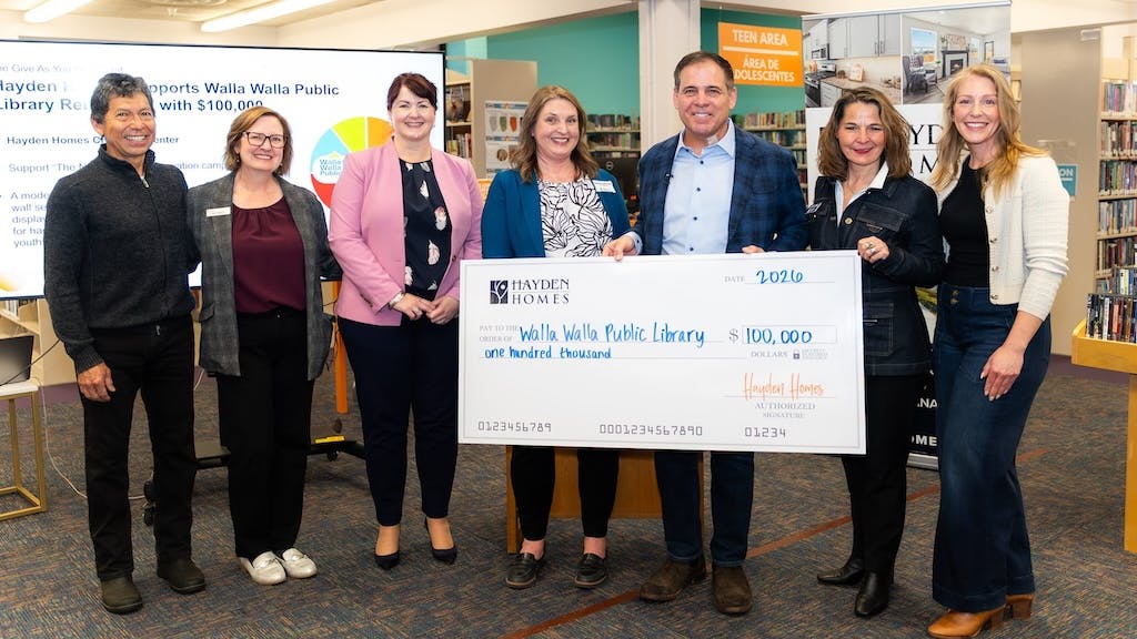 Hayden Homes gives check to Walla Walla Public Library