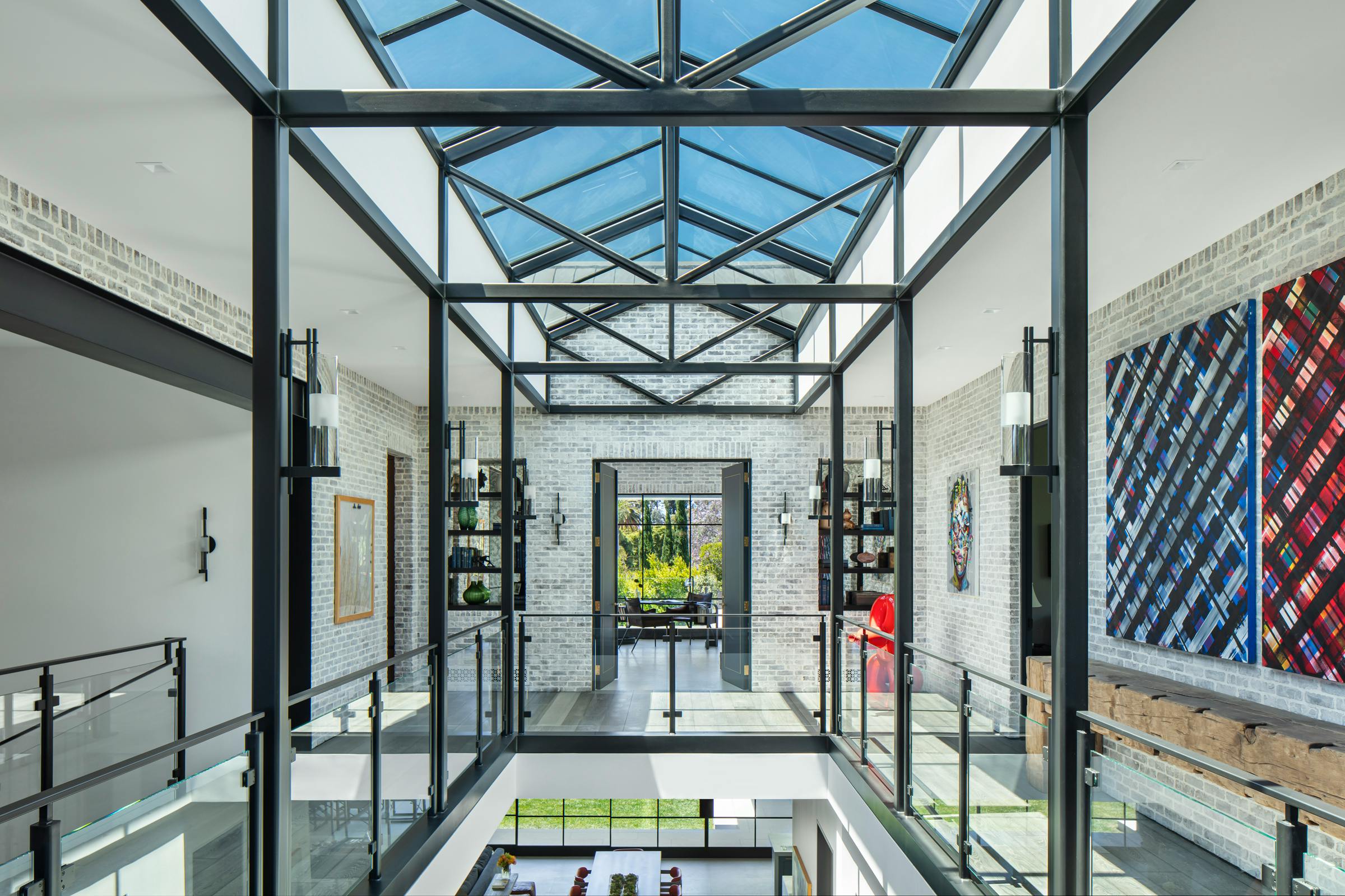 The atrium of this custom home is one of several 'memory points' featured below, all delivering a sense of wonder and unforgettable moments.