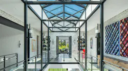 The atrium of this custom home is one of several 'memory points' featured below, all delivering a sense of wonder and unforgettable moments.