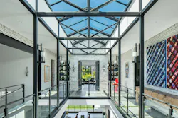 The atrium of this custom home is one of several 'memory points' featured below, all delivering a sense of wonder and unforgettable moments. The atrium of this custom home is one of several 'memory points' featured below, all delivering a sense of wonder and unforgettable moments.