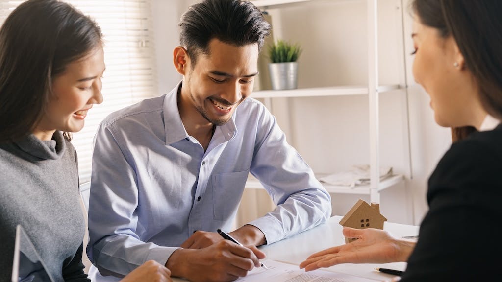 Gen Z couple purchasing a home