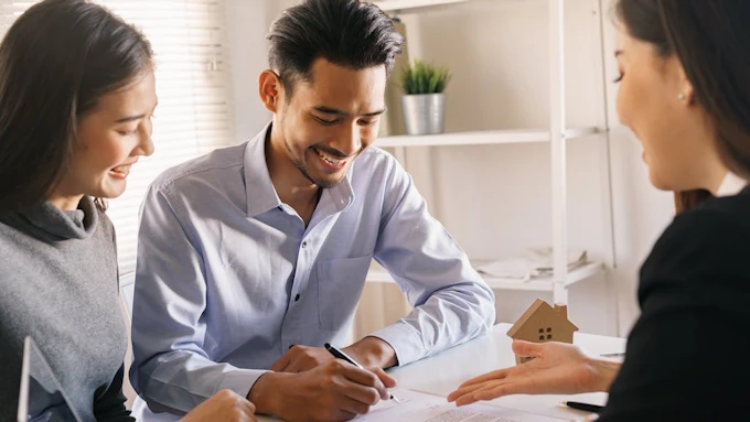 Gen Z couple purchasing a home