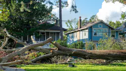 Damage to a neighborhood after a hurricane Damage to a neighborhood after a hurricane