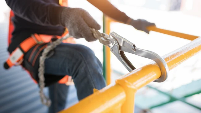 Construction worker practicing safe jobsite practices