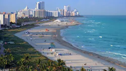 Miami Beach with city skyline in the background Miami Beach with city skyline in the background