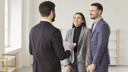 House hunters touring a home