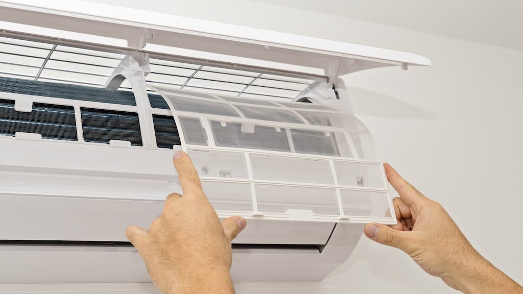 Changing a filter on an air conditioning unit
