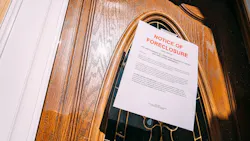 Foreclosure notice taped to a front door