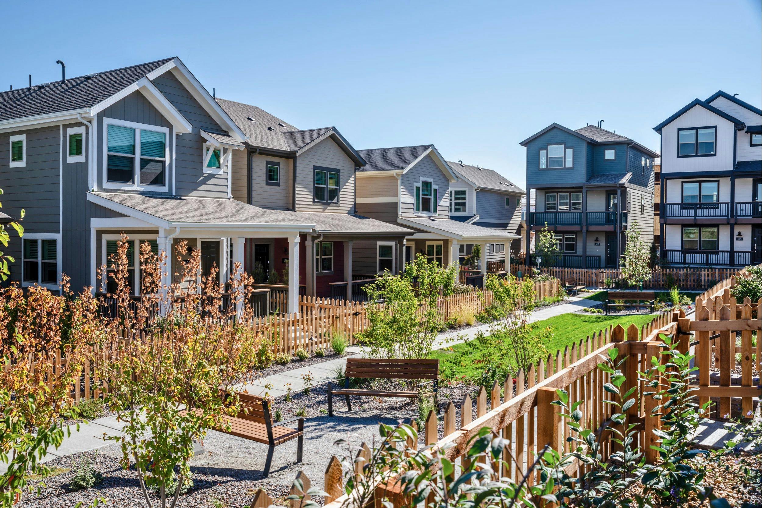 The Cottages at Erie Commons by Osmosis Architecture offer a mix of two- and three-story homes, varied floor plans, and distinct elevations in a dedicated for-rent community.