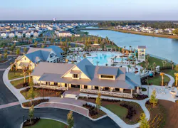 Located inside the Lakehouse (above), the Sales Experience for Carnes at Crossroads is designed to capture a more diverse buyer demographic.