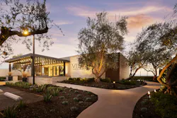 The Sales Center for Vista in Summit in Orchard Hills, Calif., is a well-appointed, double-wide trailer fitted with technology that tells the story of home designs and models not yet completed. It is also sited with a view of the city and the Pacific Ocean in the distance, while the exterior was transformed with with decorative stone.