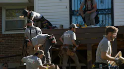 Deckorators certified pros work to construct a ramp during Build it Forward event in Nashville