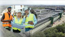 Three construction. workers looking at a data c enter